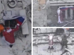 (Видео) Војник облечен како Дедо Мраз со руско знаме на снимка од Мирнохрад – спротивставени тврдења за контролата на градот